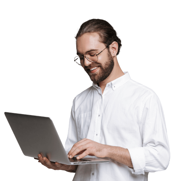 Man holding some boxes while smiling.